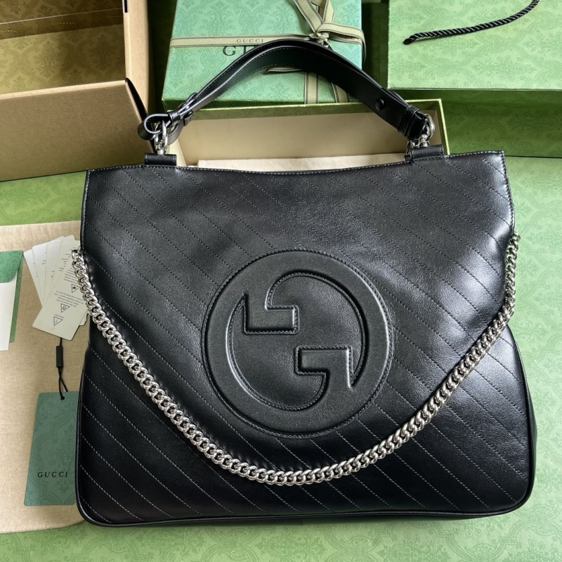 G*u*i top handle bags